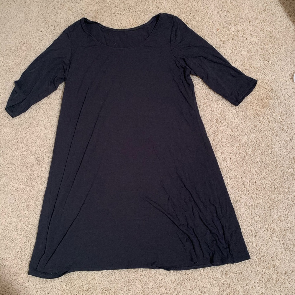 This is a short dress but can be worn as a shirt.
